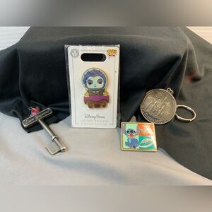 Disney Parks Collectibles 2 pins, one key chain, one Disney key